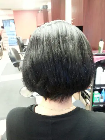 A client's sleek bob after a smoothing treatment